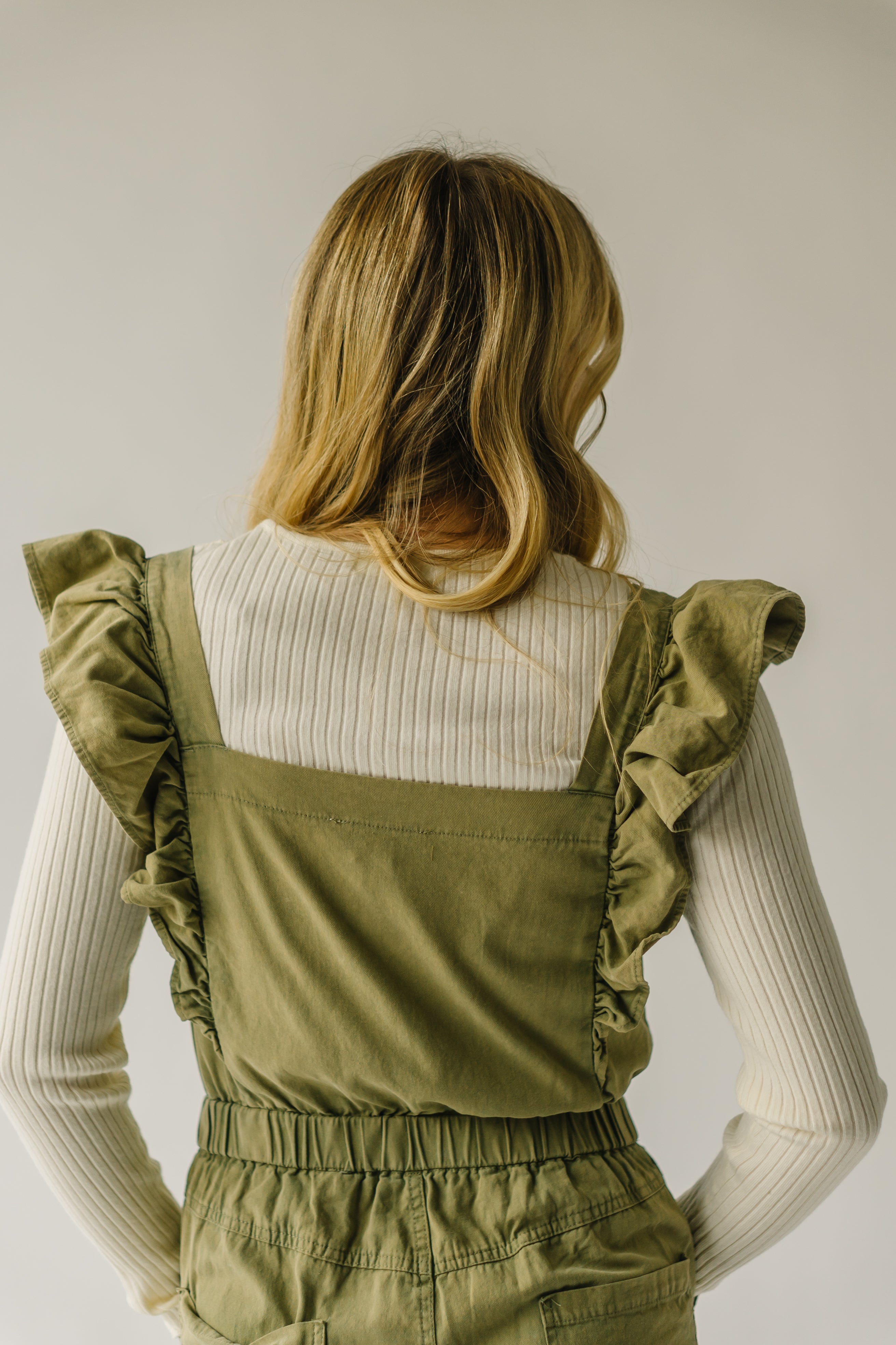 The Zenger Ruffle Sleeve Jumpsuit in Olive